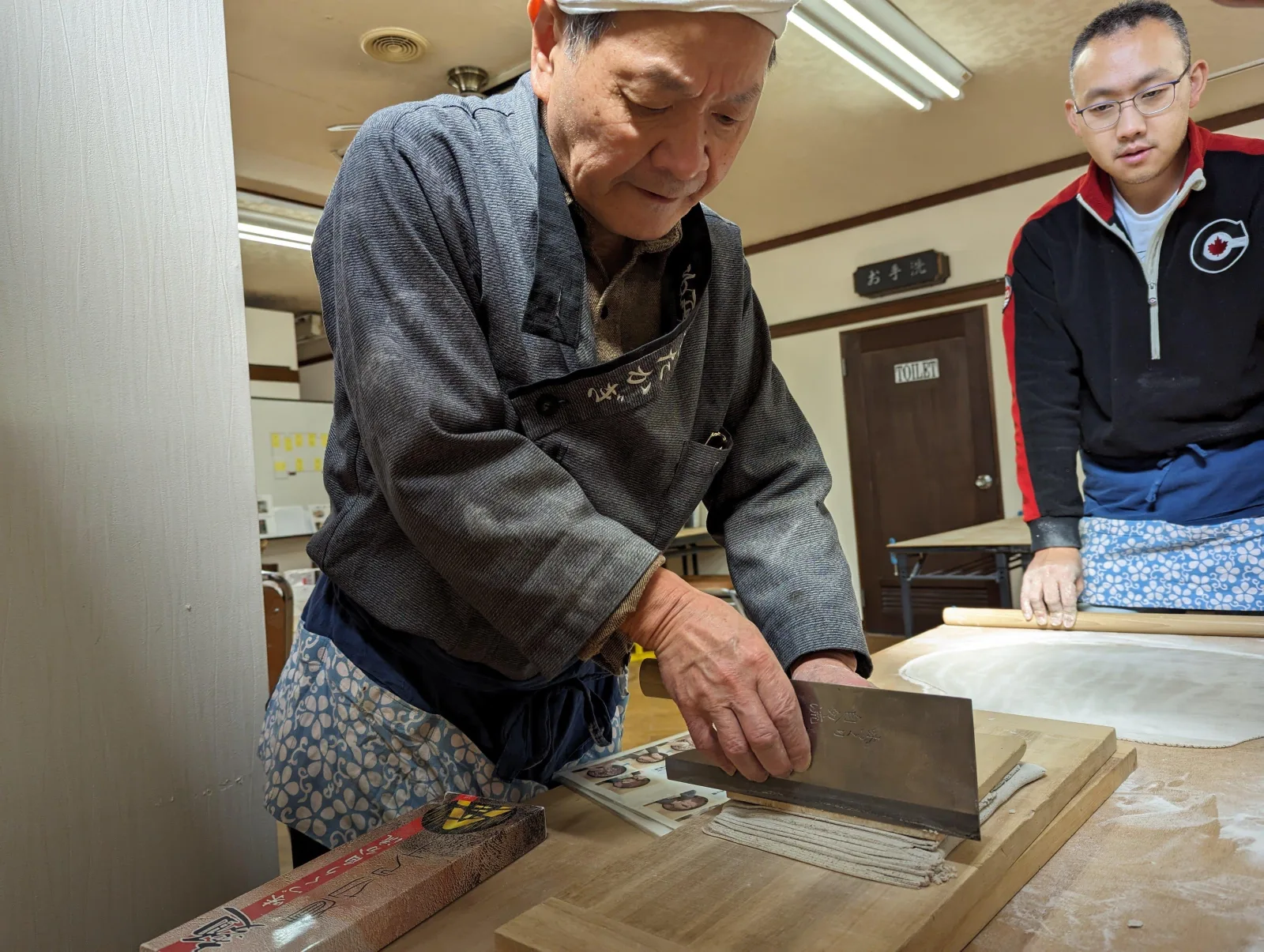 Cutting fresh soba noodles during the workshop